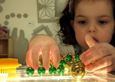 Bambini & Me student playing with colors and light